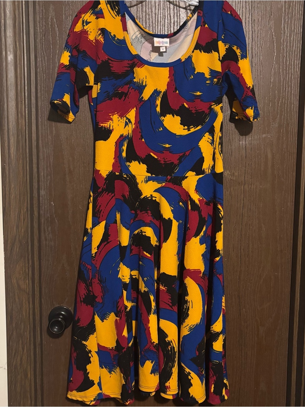LuLaRoe Multicolor Yellow Blue Red Brushstroke Top